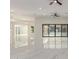 Open living room with sliding glass doors to the outside at 9357 W Canyon Verde Dr, Casa Grande, AZ 85194
