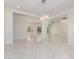 Spacious living room with marble floors and recessed lighting at 9357 W Canyon Verde Dr, Casa Grande, AZ 85194