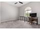 Bright bedroom with a functional desk area and natural light at 9825 E Gary St, Mesa, AZ 85207