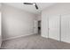 Spacious bedroom featuring carpet and closet storage at 9825 E Gary St, Mesa, AZ 85207