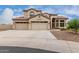 Beautiful two-story home featuring a three-car garage, desert landscaping, and a tile roof at 9825 E Gary St, Mesa, AZ 85207