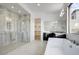 Modern bathroom featuring a large walk-in shower, soaking tub, and double sink vanity at 100 W Northern Ave # 7, Phoenix, AZ 85021