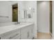 Bathroom with white vanity, chrome fixtures, and a large mirror at 100 W Northern Ave # 7, Phoenix, AZ 85021