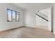 Bright bedroom with hardwood floors, ample natural light, and neutral decor at 100 W Northern Ave # 7, Phoenix, AZ 85021