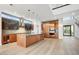 Spacious kitchen with large island, modern appliances, and hardwood floors at 100 W Northern Ave # 7, Phoenix, AZ 85021