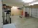 Spacious garage featuring built-in storage cabinets, workbenches, and ample room for parking and organization at 1010 N Osprey Ct, Gilbert, AZ 85234