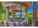 Elegant gazebo offering scenic views of the community pool and lush surroundings, perfect for relaxation and outdoor enjoyment at 1010 N Osprey Ct, Gilbert, AZ 85234