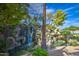 Scenic water feature with tiered waterfalls and lush greenery, providing a tranquil and natural oasis within the community at 1010 N Osprey Ct, Gilbert, AZ 85234