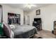 Bedroom features closet, wood-look flooring, ceiling fan, and a window at 1014 W Mulberry Dr, Chandler, AZ 85286