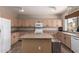 Bright kitchen with a central island, great lighting, and plentiful cabinet space at 1014 W Mulberry Dr, Chandler, AZ 85286