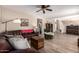 Open living area with comfortable seating, wood floors, and neutral paint at 1014 W Mulberry Dr, Chandler, AZ 85286