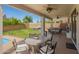 Covered patio with outdoor seating, a hot tub and backyard at 1014 W Mulberry Dr, Chandler, AZ 85286