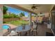 Covered patio with outdoor seating area, featuring a hot tub and pool at 1014 W Mulberry Dr, Chandler, AZ 85286