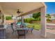 Covered patio featuring comfortable seating and a clear view of the pool and backyard at 1014 W Mulberry Dr, Chandler, AZ 85286