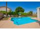 Enjoy this backyard with a refreshing pool, charming landscaping, and mature trees at 1014 W Mulberry Dr, Chandler, AZ 85286