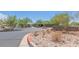 Community center entrance with attractive desert landscaping and visible gathering spots at 10623 E Acacia Dr, Scottsdale, AZ 85255