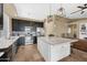 Spacious kitchen with stainless steel appliances, subway tile backsplash, and a white marble island at 10623 E Acacia Dr, Scottsdale, AZ 85255