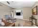 Spacious living room featuring a built-in entertainment center and neutral tones at 10623 E Acacia Dr, Scottsdale, AZ 85255