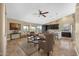 An open-concept living room next to the kitchen creates an inviting space for gatherings and relaxation at 10623 E Acacia Dr, Scottsdale, AZ 85255