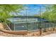 Several well-lit tennis courts are available, providing an opportunity for recreational play at 10623 E Acacia Dr, Scottsdale, AZ 85255