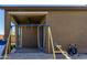 Backyard with a covered patio, playset and plenty of artificial grass at 10949 N 183Rd Dr, Surprise, AZ 85388