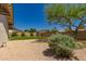 Well-kept backyard with shrubbery and gravel at 1115 E Carter Dr, Tempe, AZ 85282
