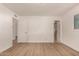 Bright and airy bedroom with wood-look floors and an ample amount of space at 1115 E Carter Dr, Tempe, AZ 85282