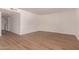 Bright living room with new light wood floors and neutral paint at 1115 E Carter Dr, Tempe, AZ 85282