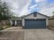 Charming single-Gathering home with a two-car garage and manicured front yard at 11770 W Aster Dr, El Mirage, AZ 85335
