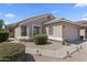 Attractive single-story home featuring desert landscaping, stone accents, and a neutral-colored exterior at 1241 E Elm Rd, San Tan Valley, AZ 85140
