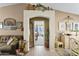 Open floor plan connects the living room to the dining room and offers a glimpse into the bedroom at 1241 E Elm Rd, San Tan Valley, AZ 85140