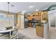 Bright eat-in kitchen features stainless steel appliances, tile flooring, and plenty of natural light at 1241 E Elm Rd, San Tan Valley, AZ 85140