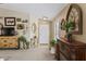Inviting living room featuring an ornate fireplace, and stylish decor at 1241 E Elm Rd, San Tan Valley, AZ 85140