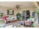 Outdoor patio seating area with vibrant plants and garden views at 1241 E Elm Rd, San Tan Valley, AZ 85140