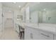 Bright bathroom features double vanity, quartz countertops, and tiled walk-in shower at 1272 W Camina Buena Vis, Queen Creek, AZ 85140