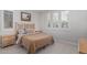 Bedroom showcasing natural light, neutral walls and tiled floors at 1272 W Camina Buena Vis, Queen Creek, AZ 85140