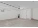 Spacious and clean garage featuring ample space for storage and vehicles at 1272 W Camina Buena Vis, Queen Creek, AZ 85140