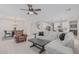 Spacious open floor plan showcases a modern kitchen and cozy living area with bright natural light at 1272 W Camina Buena Vis, Queen Creek, AZ 85140
