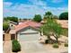 Aerial view of the home highlighting the landscaped surroundings at 15802 W Watson Ln, Surprise, AZ 85379