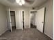 Bedroom featuring neutral walls, closet and carpeted flooring at 1723 W Cheryl Dr, Phoenix, AZ 85021