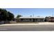 Charming single-story home with a well-maintained front yard and black chain-link fence at 1723 W Cheryl Dr, Phoenix, AZ 85021