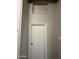Neutral colored hallway featuring paneled walls and trim at 1723 W Cheryl Dr, Phoenix, AZ 85021