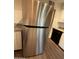 Stainless steel refrigerator in the kitchen, providing ample storage and a sleek look at 1723 W Cheryl Dr, Phoenix, AZ 85021