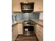 Upgraded range, ample counter space, and sleek appliances make this kitchen a chef's dream at 1723 W Cheryl Dr, Phoenix, AZ 85021