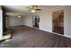 Spacious open-plan living room, showing flooring, fireplace and access to other rooms at 1723 W Cheryl Dr, Phoenix, AZ 85021