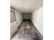 Empty storage room features a concrete floor and single access door at 1723 W Cheryl Dr, Phoenix, AZ 85021