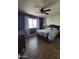 Comfortable bedroom with a large window, stylish decor, and a relaxing ambiance at 1954 E Nielson Ave, Mesa, AZ 85204