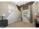 Stylish empty bedroom featuring modern art and a well-lit window, perfect for personalization at 19917 E Natalie Way, Queen Creek, AZ 85142