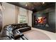 Chic living room with beamed ceiling, a large TV, and comfortable seating for ultimate relaxation and entertainment at 19917 E Natalie Way, Queen Creek, AZ 85142