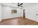 Bedroom featuring a ceiling fan, natural light, and a closet with shelving at 20 W Pasadena Ave, Phoenix, AZ 85013